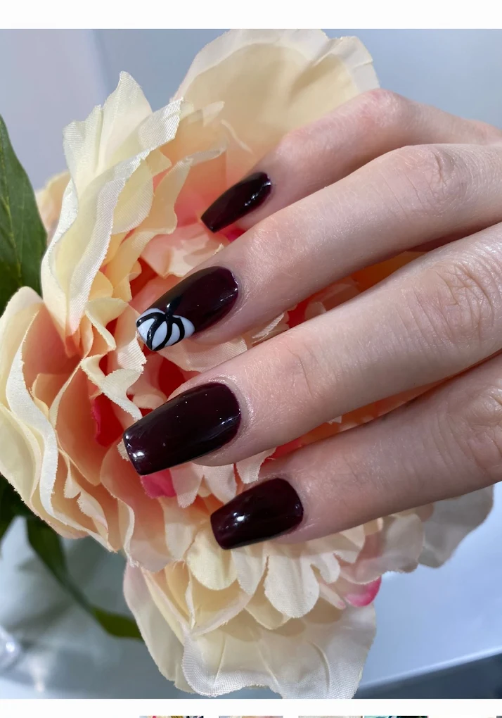 Deep burgundy glossy manicure